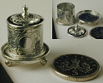 Biscuit barrel with lid on salver