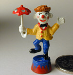 Clown with umbrella